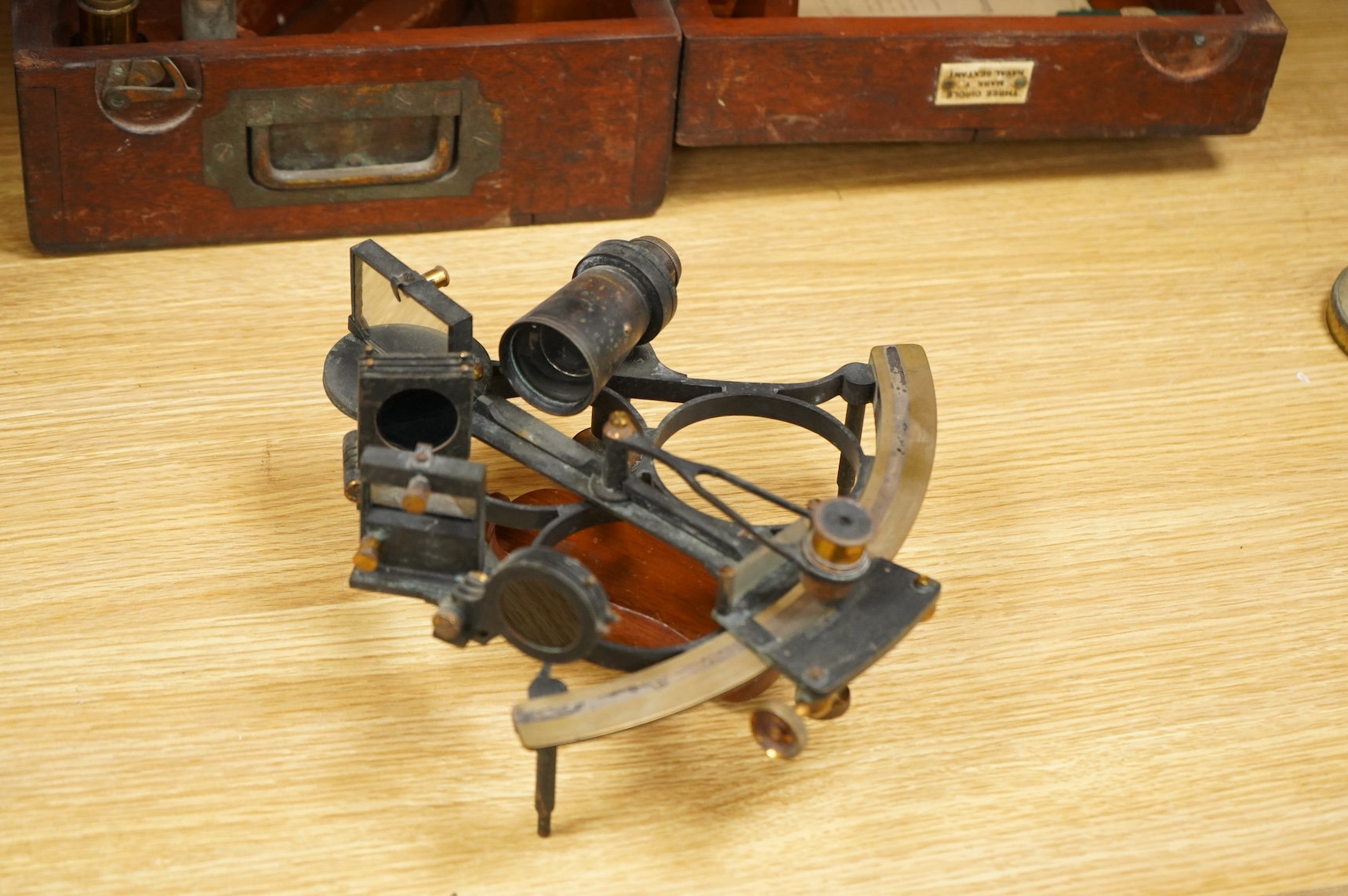 An early 20th century brass and lacquered sextant without maker’s mark, the mahogany case containing three eyepieces, card certificate of examination by the National Physical Laboratory screwed to the inside of the lid a